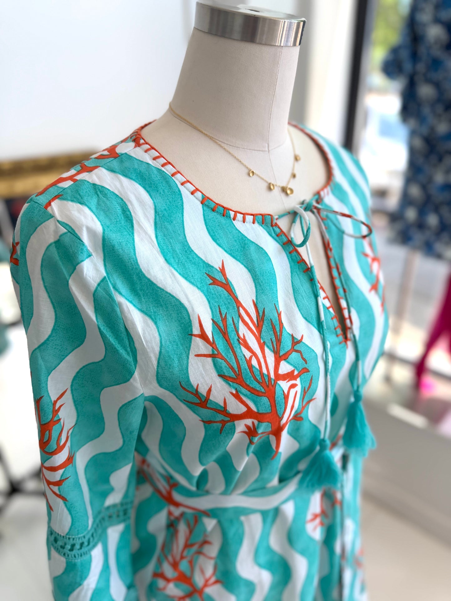 Essa Coral Sheath Dress with Stitching Details and Belt