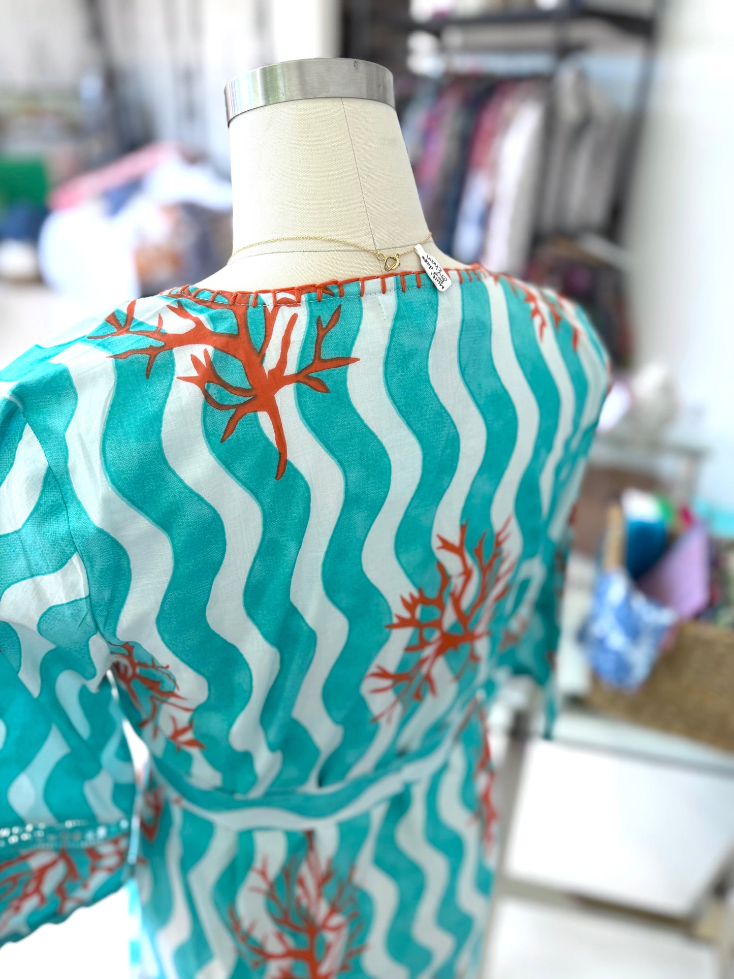 Essa Coral Sheath Dress with Stitching Details and Belt
